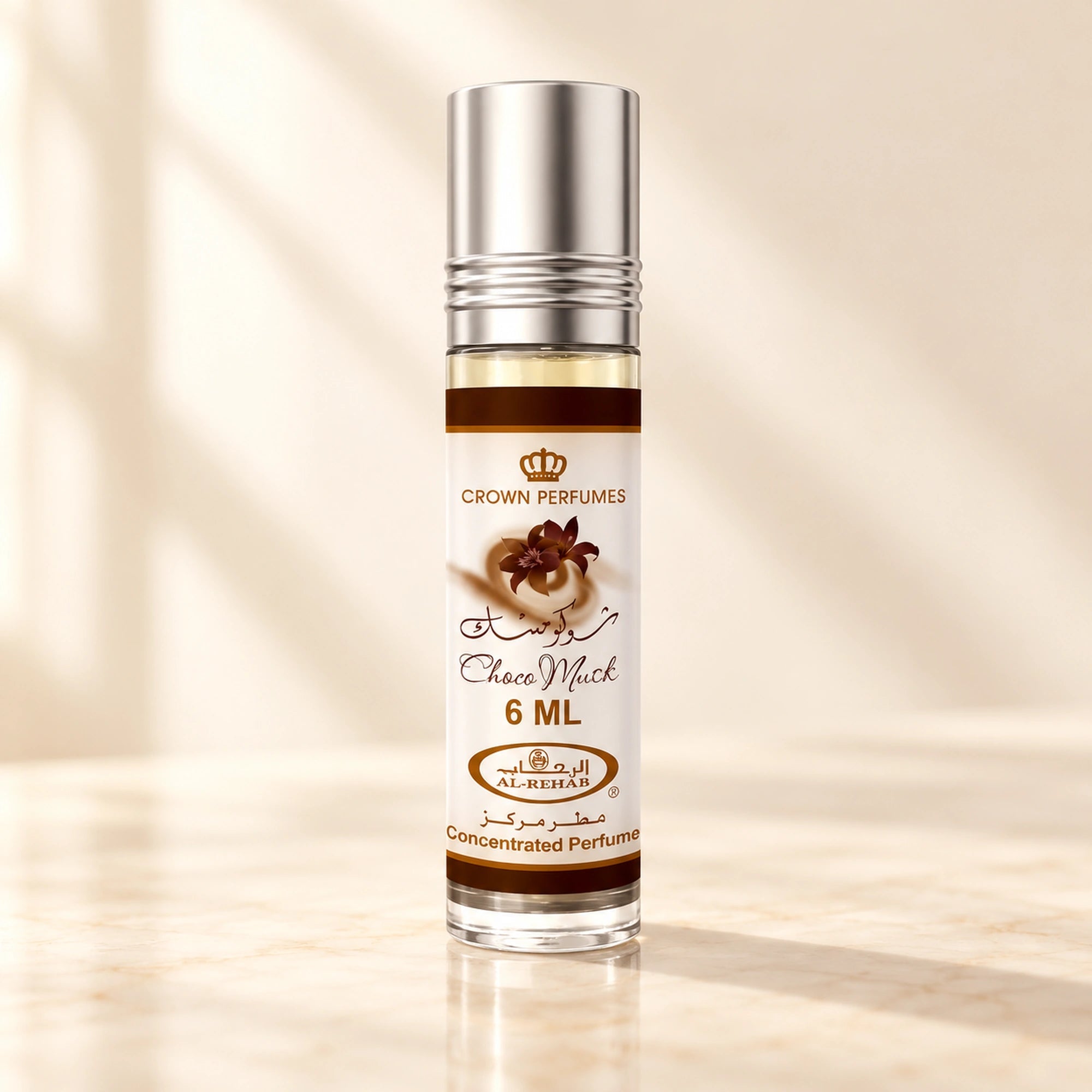 Al Rehab Choco Musk Concentrated Perfume Oil 6ml Roll-On bottle on a warm ivory vanity