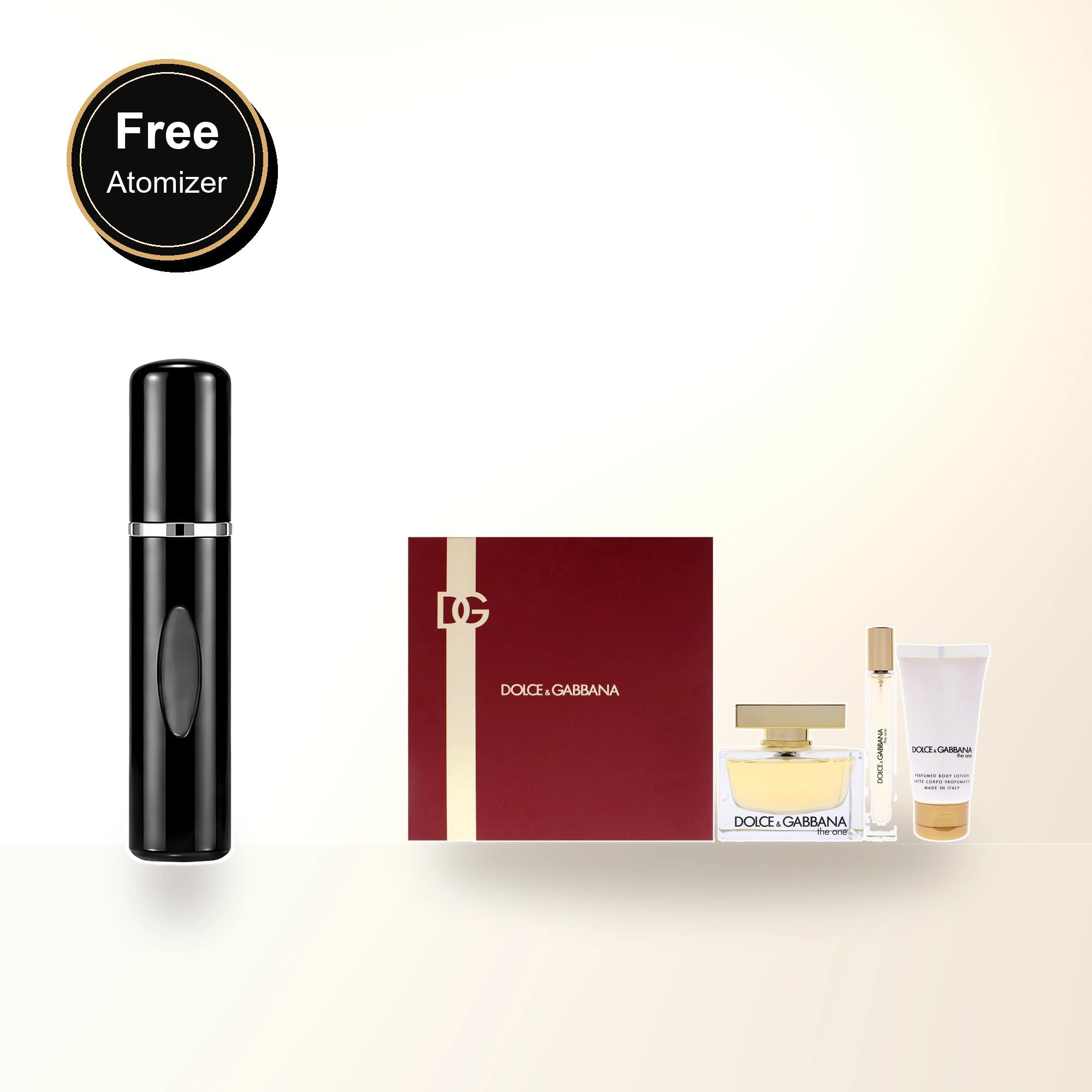 Dolce & Gabbana The One 3 Pcs Set For Women: 2.5 Eau De Parfum Spray + 0.33 Eau De Parfum Spray + 1.7 Body Lotion. with free atomizer bonus image