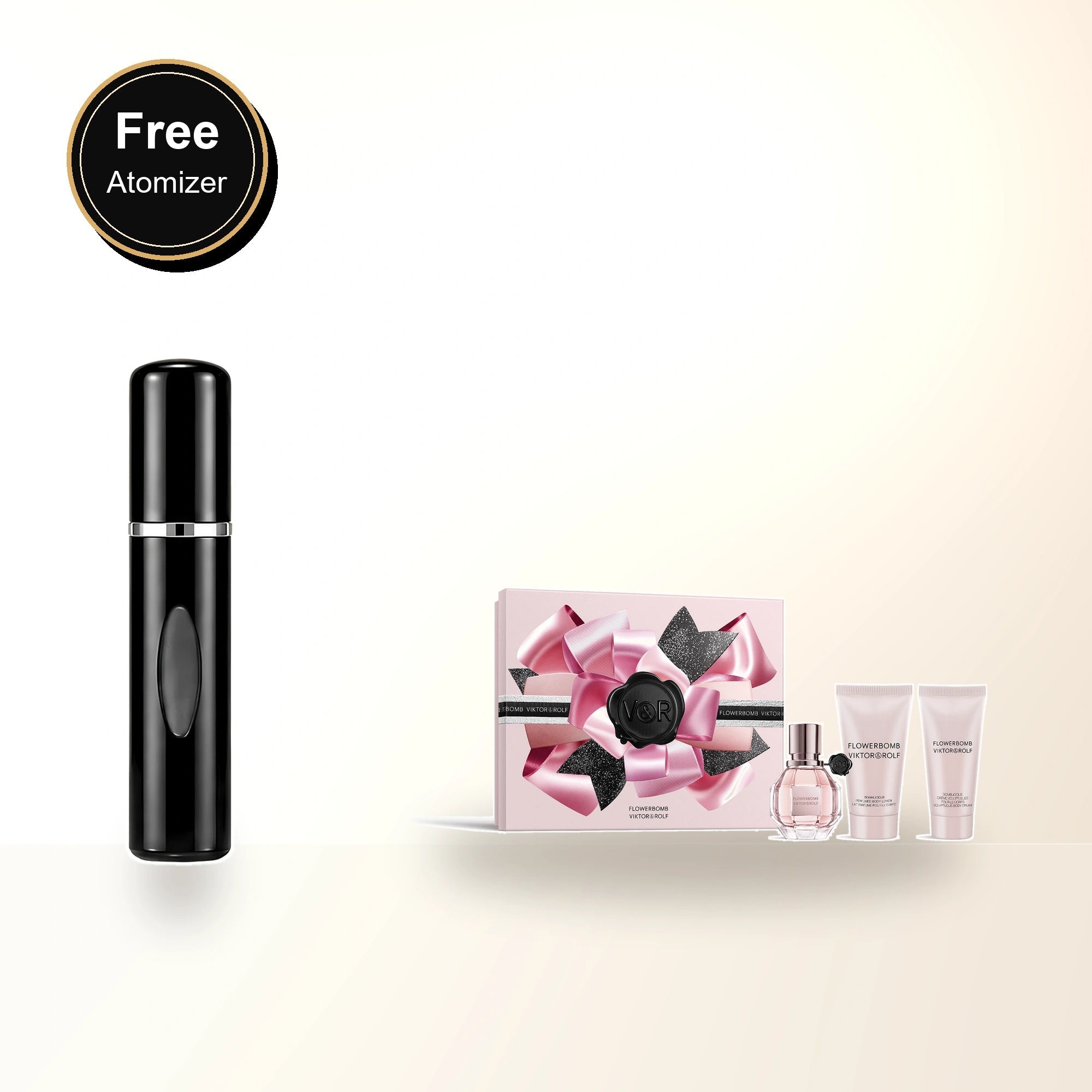 Flowerbomb 3 Pcs Set For Women: 1 Oz Eau De Parfum Spray + Bomblicious 1.7 Body Lotion + Bomblicious 1.36 Body Cream with free atomizer bonus image