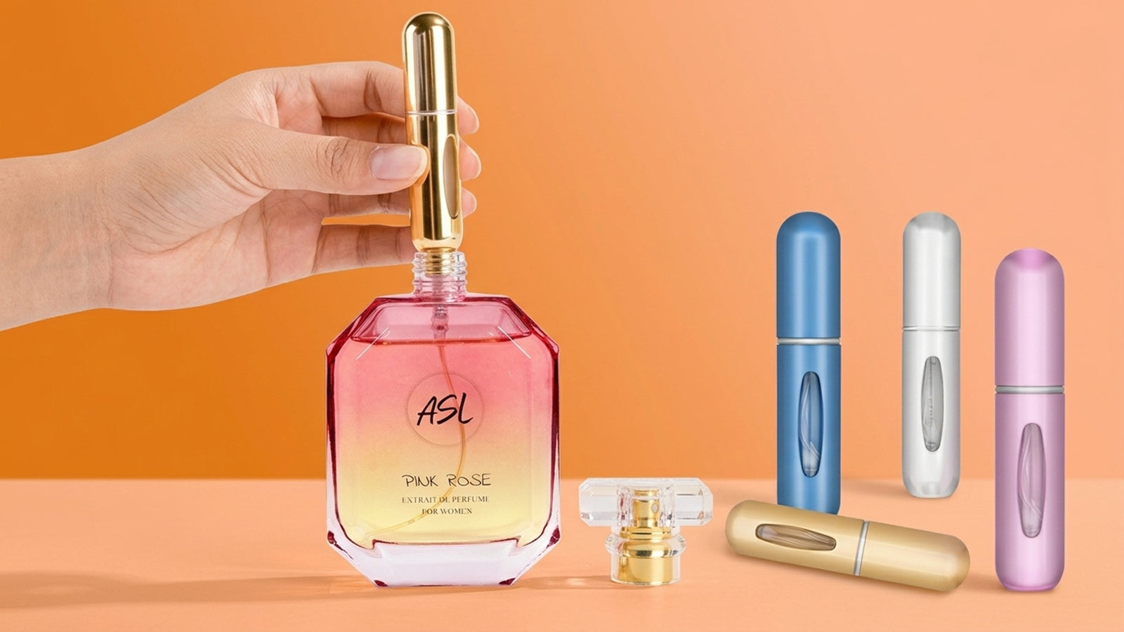 Refillable travel perfume atomizer placed beside a premium fragrance bottle
