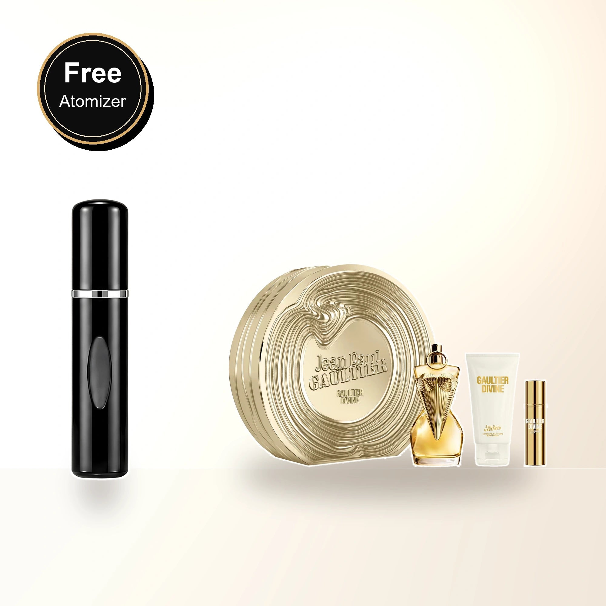 Jean Paul Gaultier Divine 3 Pcs Set For Women: 3.4 Eau De Parfum Spray + 2.5 Body Lotion + 0.34 Eau De Parfum Spray with free atomizer bonus image
