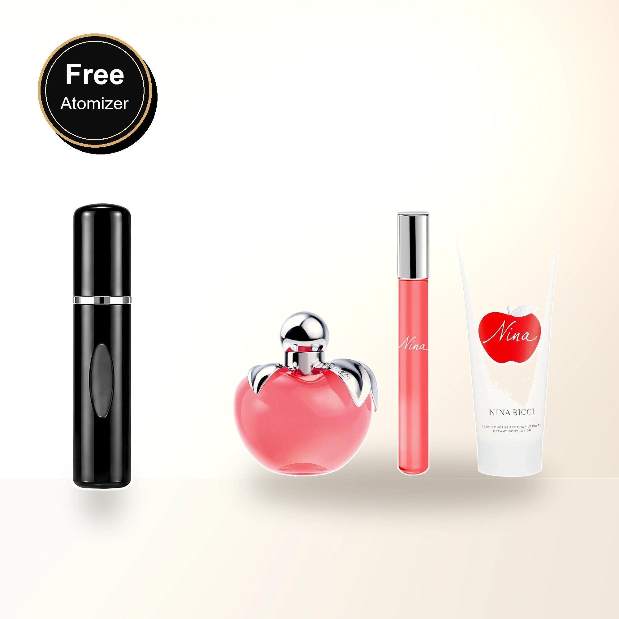 Nina Ricci Nina 3 Pcs Set For Women: 2.7 Eau De Toilette Spray + 0.34 Eau De Toilette Roll-on + 2.5 Body Lotion with free atomizer bonus image